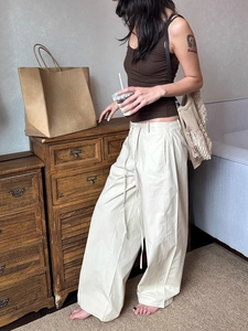 Detail view of American vintage loose fit trousers with elastic drawstring waistband