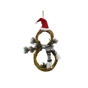 Close-up of snowman-shaped rattan Christmas wreath with red hat and knit scarf