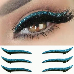 Detail of blue-black glitter eyeliner stickers on eye model and product layout