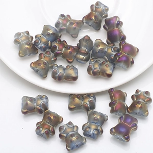 Detailed view of colorful 3D crystal bear beads for DIY necklaces and accessories
