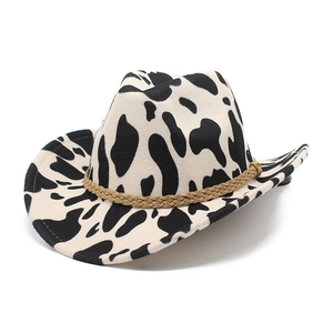 Thick cow print felt cowboy hat with rolled brim and brown braided decorative rope band
