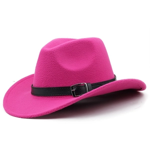 Macro detail of hot pink wool western cowboy hat with black leather belt and silver buckle