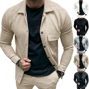 Detail showing heavy twill texture and breast pocket on men's lapel casual jacket
