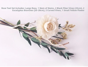 Detailed set of handmade white roses, eucalyptus leaves, and black fiber reeds for home decor