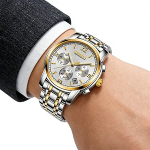 Detail shot of an elegant men's stainless steel watch with a luminous calendar dial display
