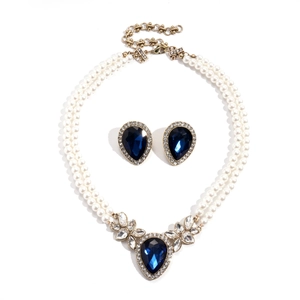 Two-piece vintage gold necklace set with deep blue waterdrop pendants and white pearls