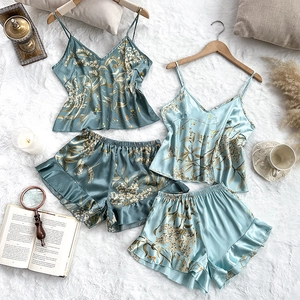 Ice silk satin sleepwear set with floral print camisole and ruffled shorts