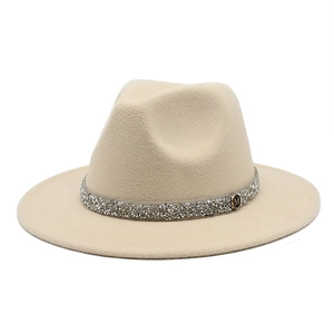 Detail of wool fedora with sparkling silver rhinestone band and silver M-letter emblem