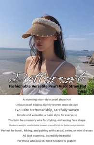 Detail of straw sun visor with pearl trim and adjustable memory wire on a beach