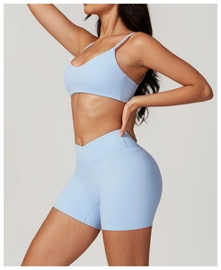 Side view of light blue yoga set with V-neck sports bra and crossover high waist shorts