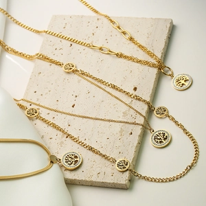 Golden Tree of Life pendant necklace with zircon crystals and layered snake chains
