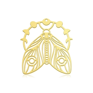 Detailed view of a gold hollow moth pendant featuring crescent moon and dot patterns
