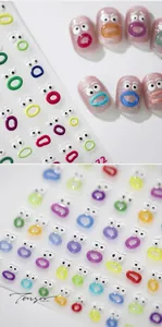 3D cartoon nail art stickers with colorful mouth and eye designs on glittery nails