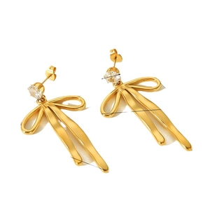 Elegant gold bow earrings with round cubic zirconia stones on a clean white background