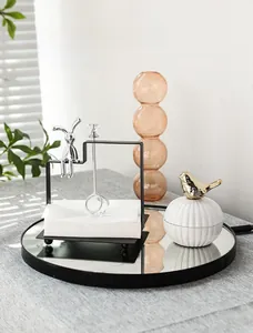 Close-up of Nordic bunny napkin holder with silver rabbit sculpture and crystal detail