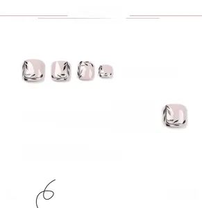 Detail view of 22 nude pink press-on toenails with elegant black leaf pattern designs
