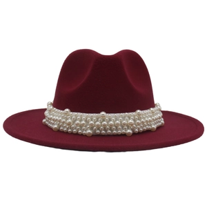 Detailed view of dark red wool fedora featuring a wide faux pearl decorative band