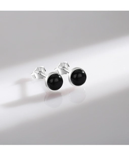 Detailed close-up of S925 sterling silver stud earrings featuring black round agate stones
