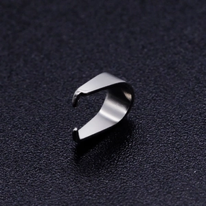 Macro shot of silver-toned U-shaped pendant bail with polished stainless steel finish