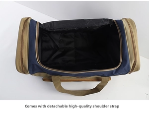 Spacious interior of large blue waterproof travel bag with detachable shoulder strap