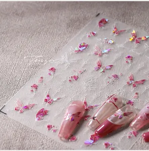 Detailed holographic butterfly and rose nail stickers with gradient pink finish