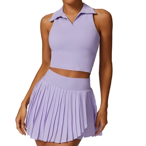Women's lavender tennis outfit set with sleeveless polo crop top and pleated mini skirt