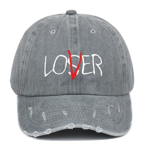 Vintage washed gray baseball cap with distressed brim and LOSER embroidery design