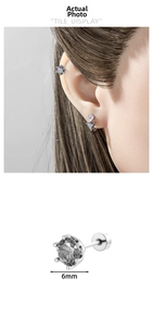 Detailed view of a 6mm grey zircon stud earring with six-prong setting and ear placement