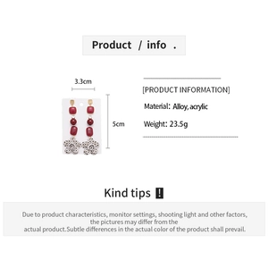 Detailed view of red acrylic floral earrings with dimensions 3.3cm by 5cm and alloy material