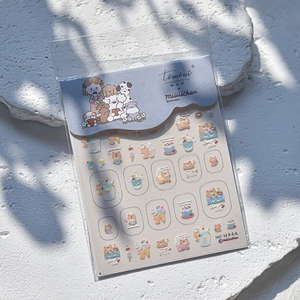 Macro view of cartoon dog nail stickers with iridescent shell finish on stone background
