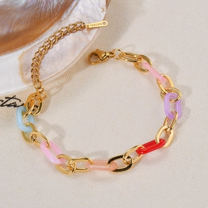 Golden stainless steel chain bracelet with colorful resin links and lobster clasp closure