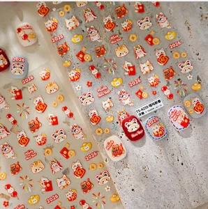 Detailed 3D embossed New Year nail stickers featuring cute lucky cats and red envelopes