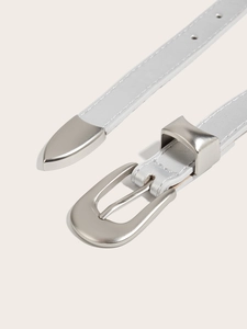 Detailed close-up of a slim silver belt featuring a curved buckle and metal tip accents