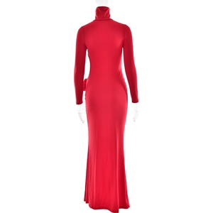 Close-up of a red high-neck dress featuring cut-out detail and 3D floral decoration