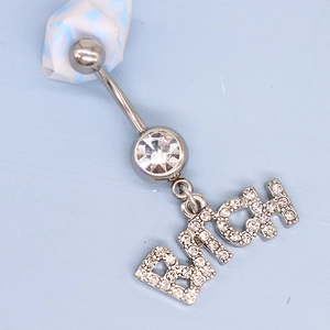 Navel ring with silver finish, sparkling rhinestones, and hanging pink letter pendant