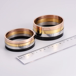 Minimalist stainless steel bangles in four colors with inner diameters of 5cm and 6cm