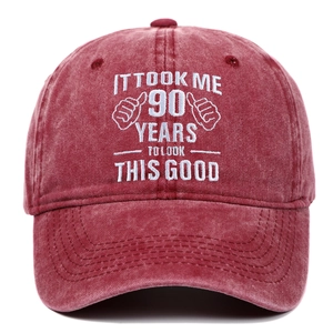 Vintage red washed cotton baseball cap with embroidered 90th birthday slogan