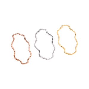 Set of three minimalist wave textured titanium steel rings in gold silver and rose gold