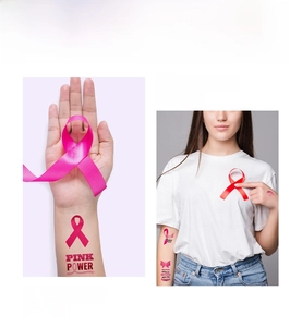 Pink ribbon temporary tattoos for breast cancer awareness showing wrist and arm application