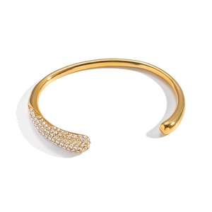Polished 18K gold plated stainless steel open bangle with sparkling pave zircon accents