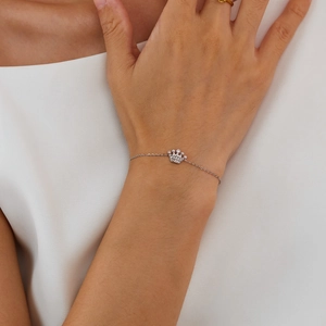 Elegant stainless steel crown bracelet for women with sparkling diamonds on a silver chain