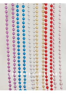 Close-up of shiny metallic Christmas bead chains in multiple colors for festive tree decoration