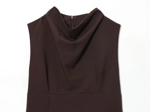 Detail of the elegant draped neckline and matte fabric on a sleeveless brown top