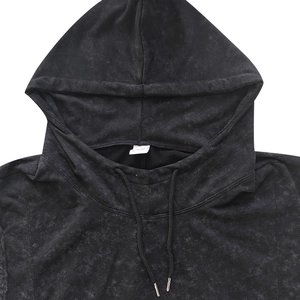 Detail of washed black sleeveless hoodie showing neckline, hood, and metal-tipped drawstrings