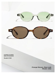 Detailed shot of oval sunglasses in translucent green and tortoiseshell with silver diamond rivets