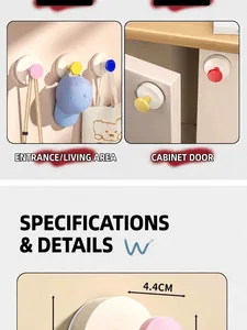 Detail view of 4.4cm colorful suction hooks mounted on cabinets and hallway walls