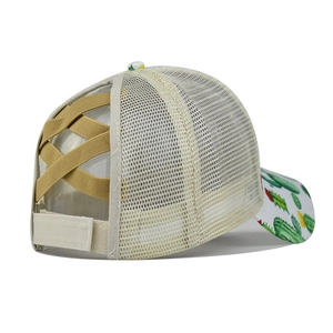 Detail of cross-elastic bands on cactus print ponytail baseball cap with mesh back