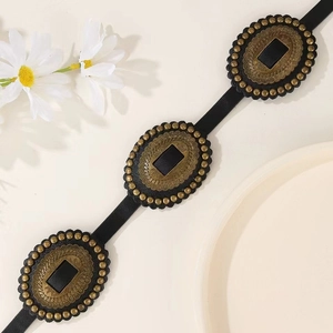 Vintage western black PU leather belt with three ornate bronze buckles and flower decor