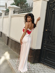 Elegant satin maxi dress with red and cream color-blocking and lace trim on back