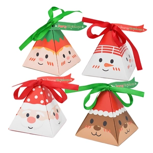 Detail of triangular Christmas gift boxes with ribbons featuring snowman and elf designs